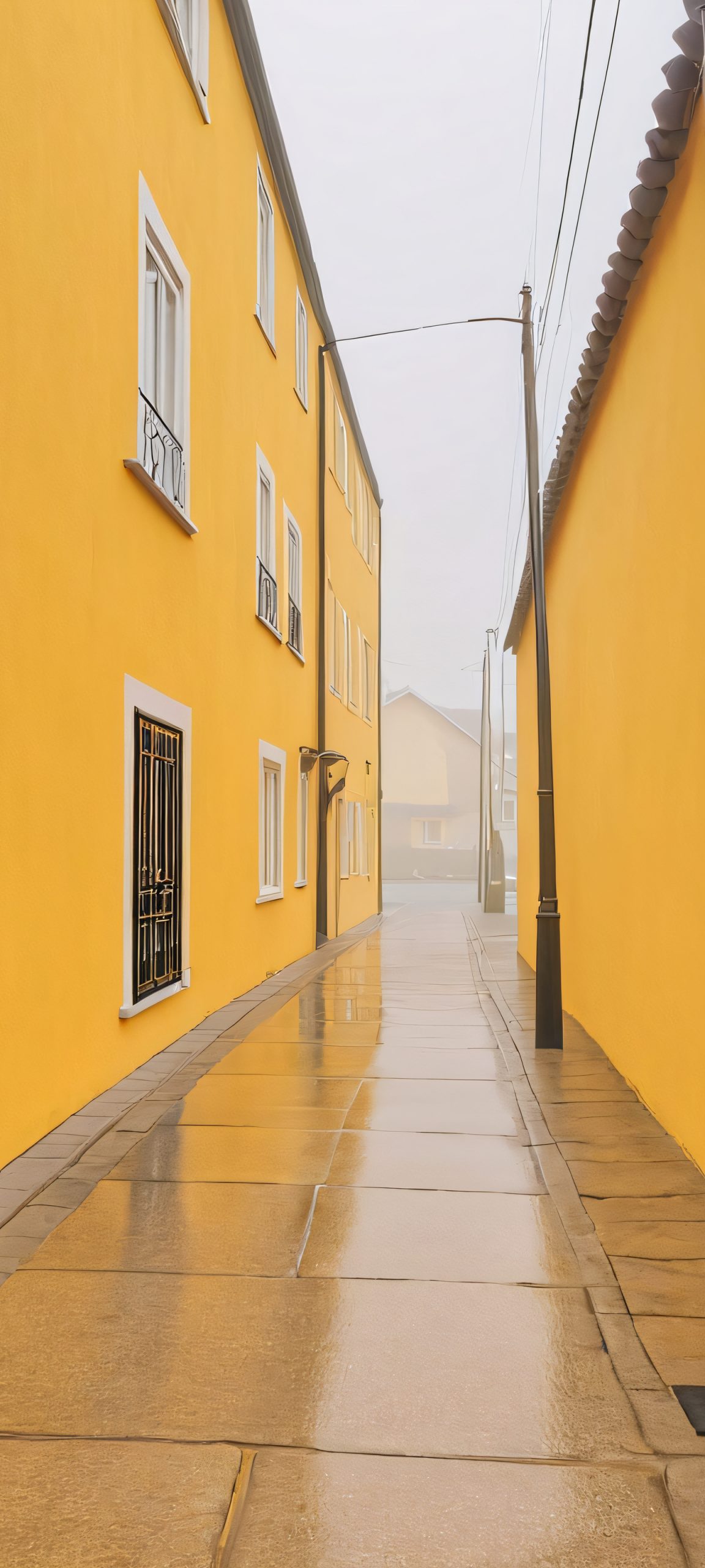 Urban landscape of yellow wall, suburban street, and soft overcast sky, perfectly optimized for iPhone, Samsung Galaxy, and Android home screens