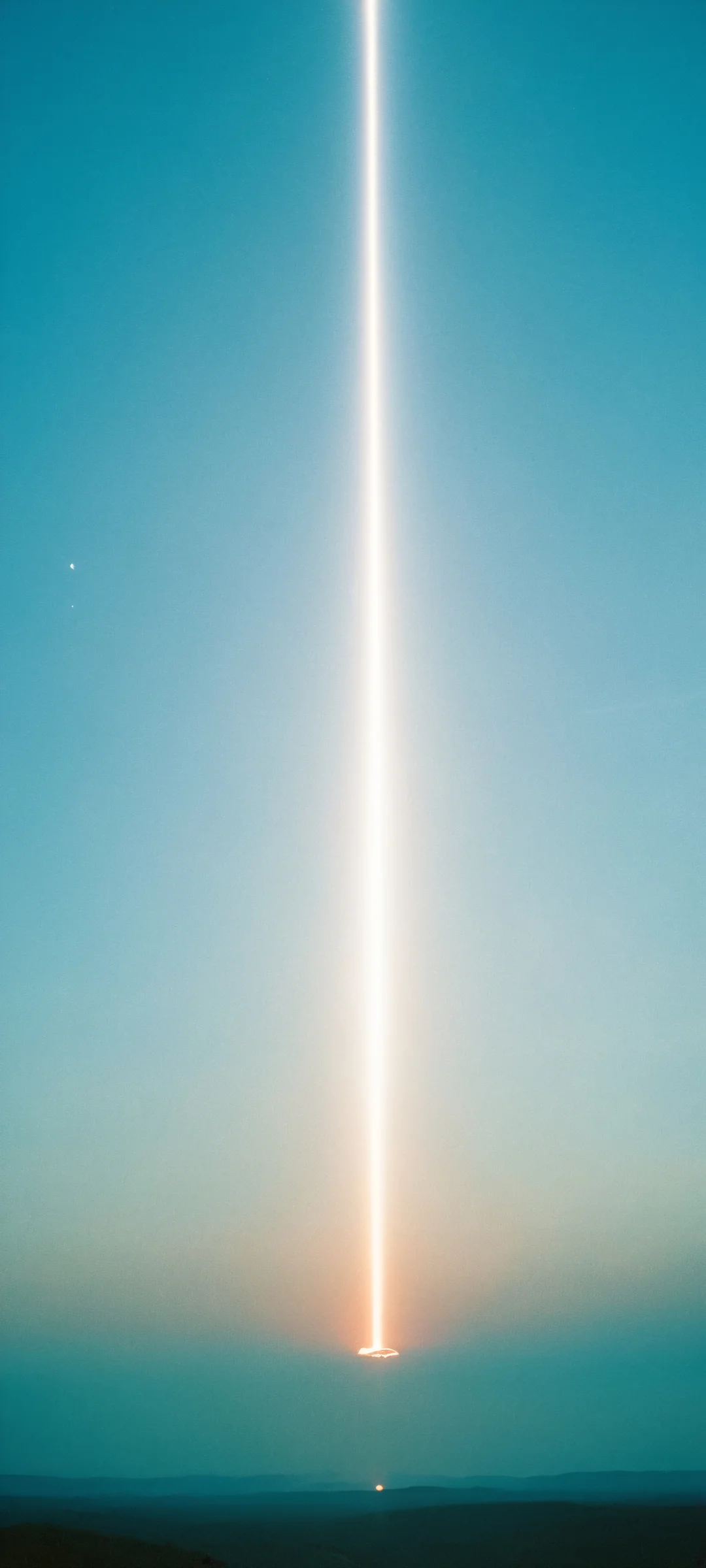 A stunning vertical mobile wallpaper featuring a luminous light beam emanating from the sky, perfect for iPhone/Android devices.