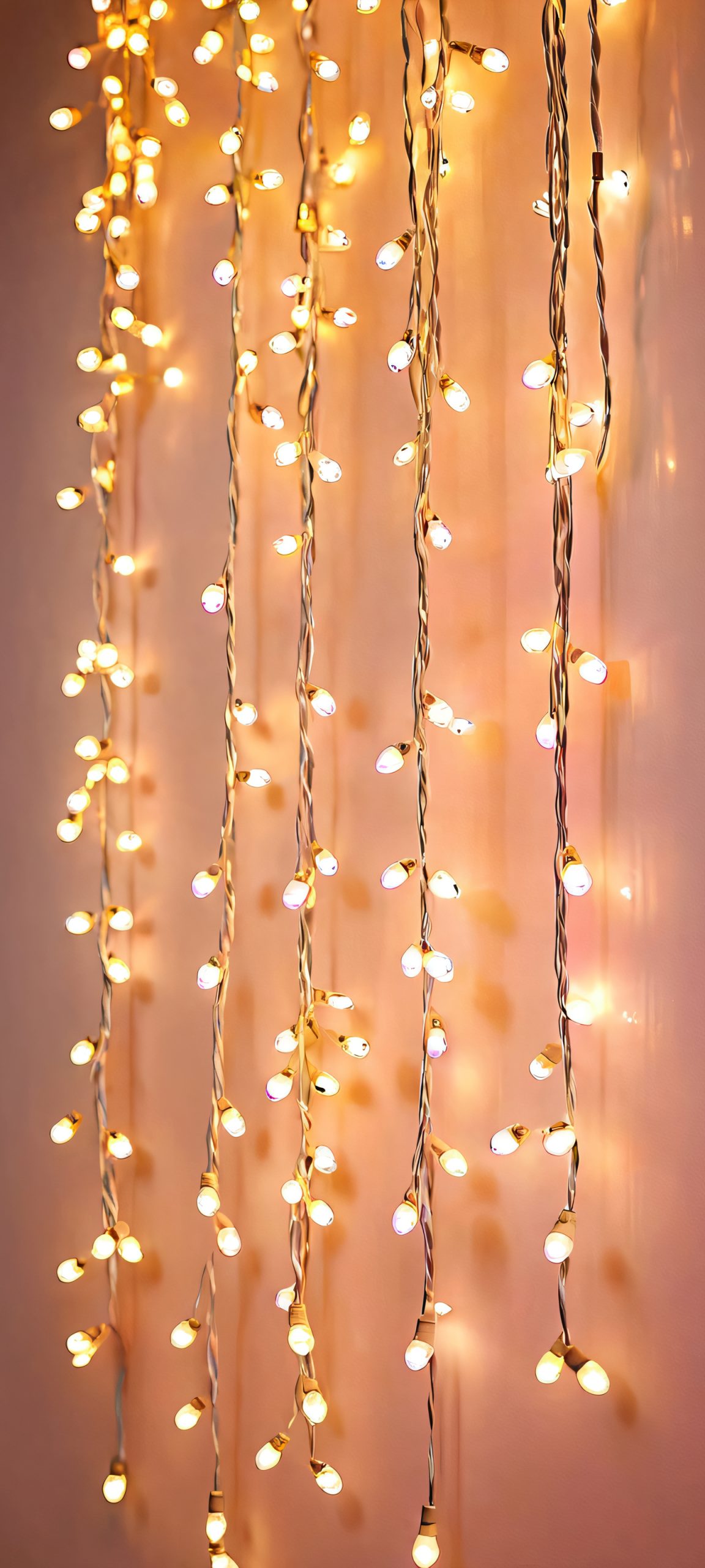 Fairy Light Serenade Lock Screen for iOS & Android iPhone and Android users will love this whimsical fairy light scene with a warm glow in a cozy dark room. Perfect for your mobile phone's home screen!