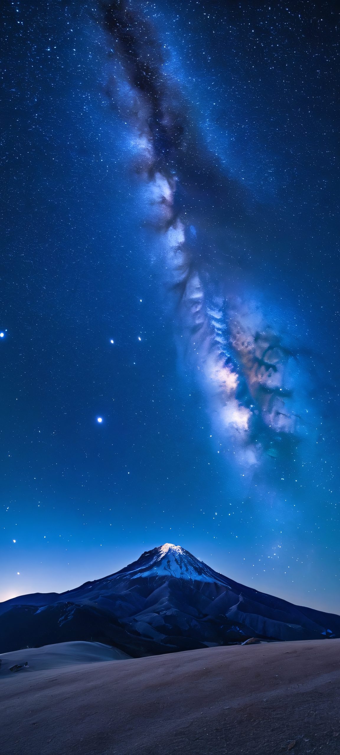 Galactic Horizon iPhone & Samsung QHD Wallpaper A stunning image of the Milky Way at night, captured on a mountain with iPhone or Android. Perfect for your mobile home screen.