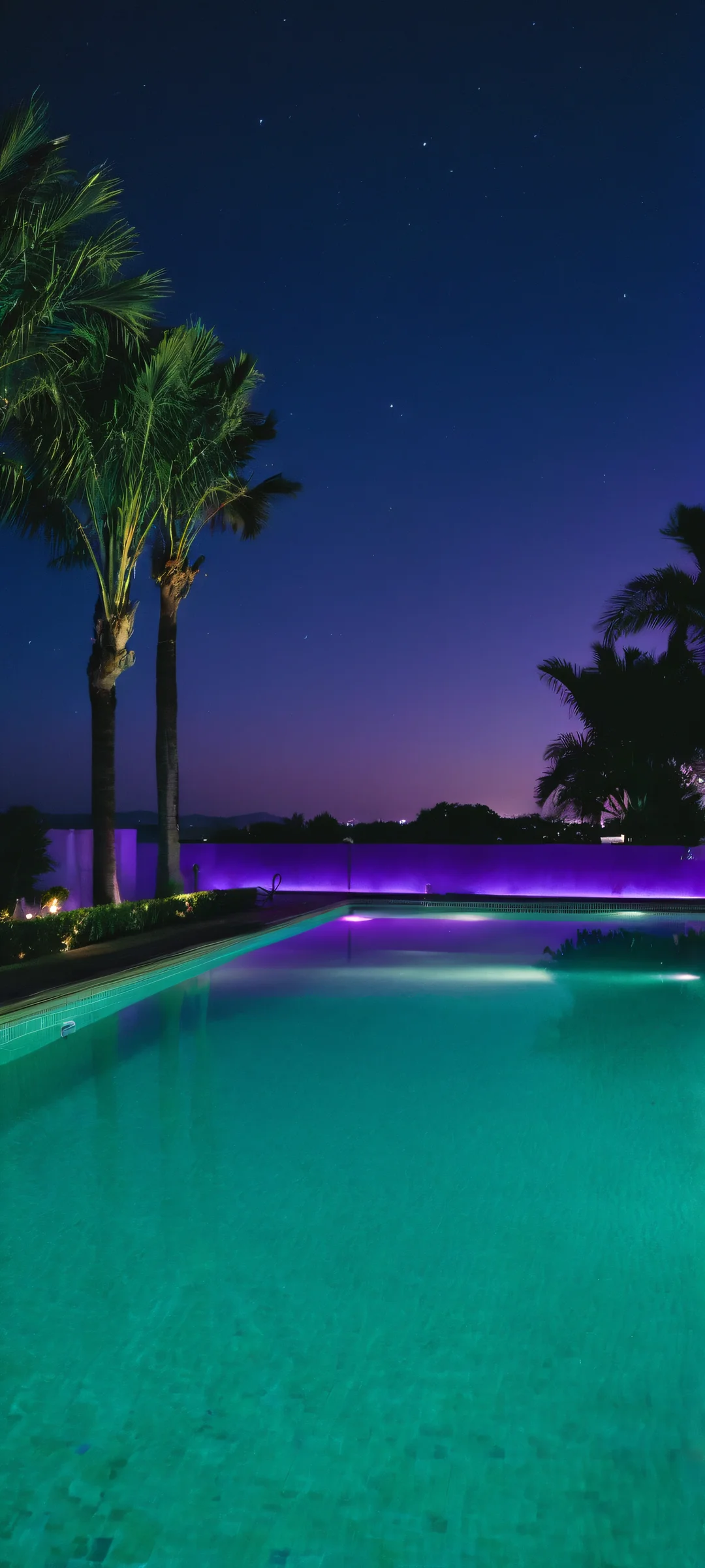 A serene and moody nighttime scene of a swimming pool, perfect for iPhone/Android home screens.