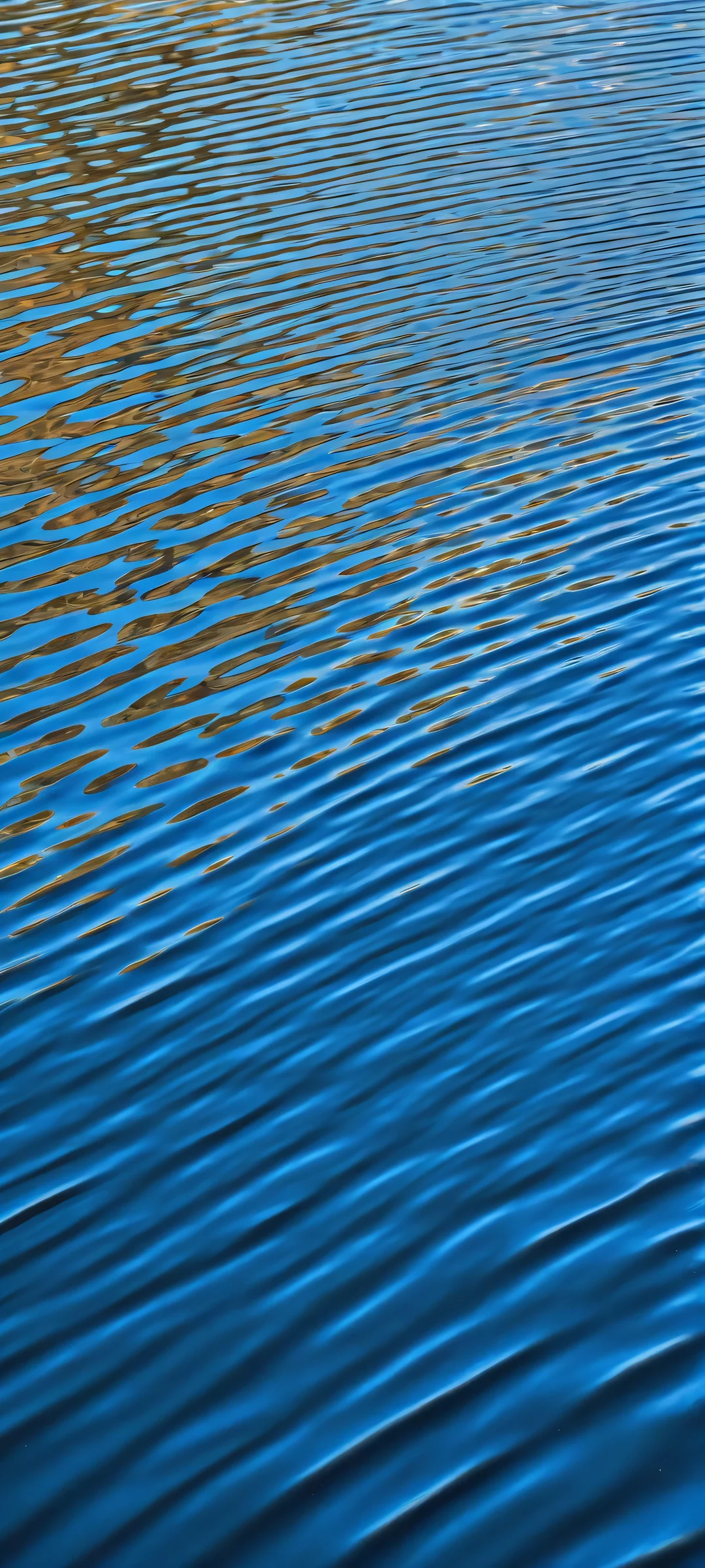 Close-up of dark blue water ripples on a blonde background - perfect for iPhone and Android devices