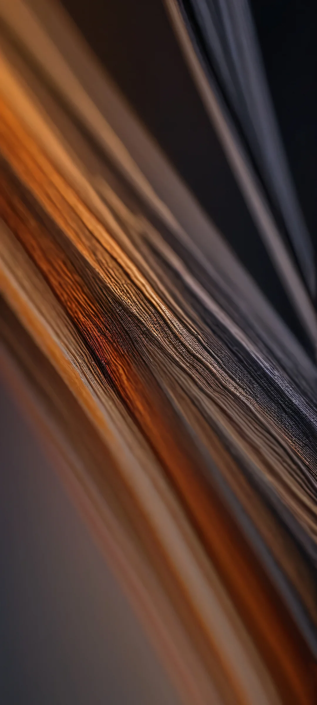 iPhone/Android wallpaper featuring dark earth tones and rusty textures. Perfect for a moody home screen.